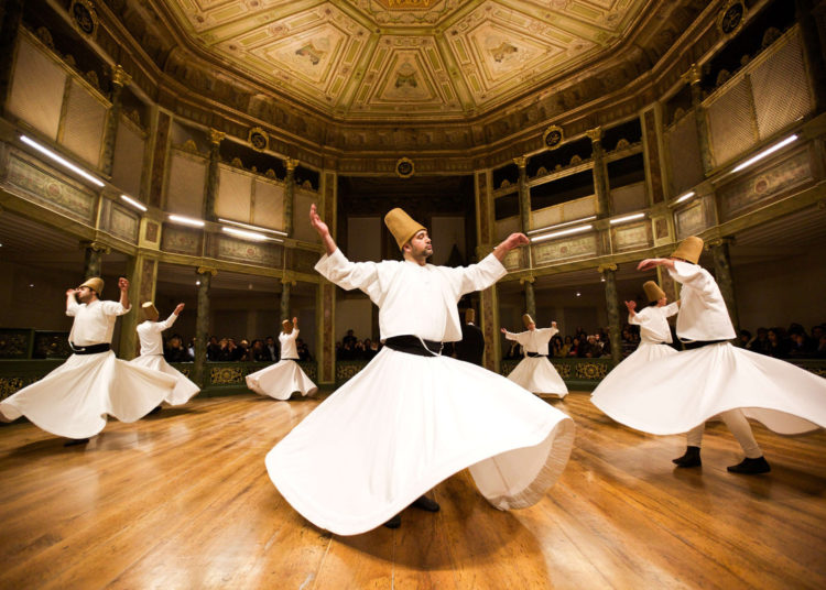 Whirling dervishes perform at the Galata Mevlevihane (The Lodge of the Dervishes) in Istanbul. The dervishes are adepts of Sufism, a mystical form of Islam that preaches tolerance and a search for understanding. Those who whirl, like planets around the sun, turn dance into a form of prayer. (Gurcan Ozturk/Getty Images)